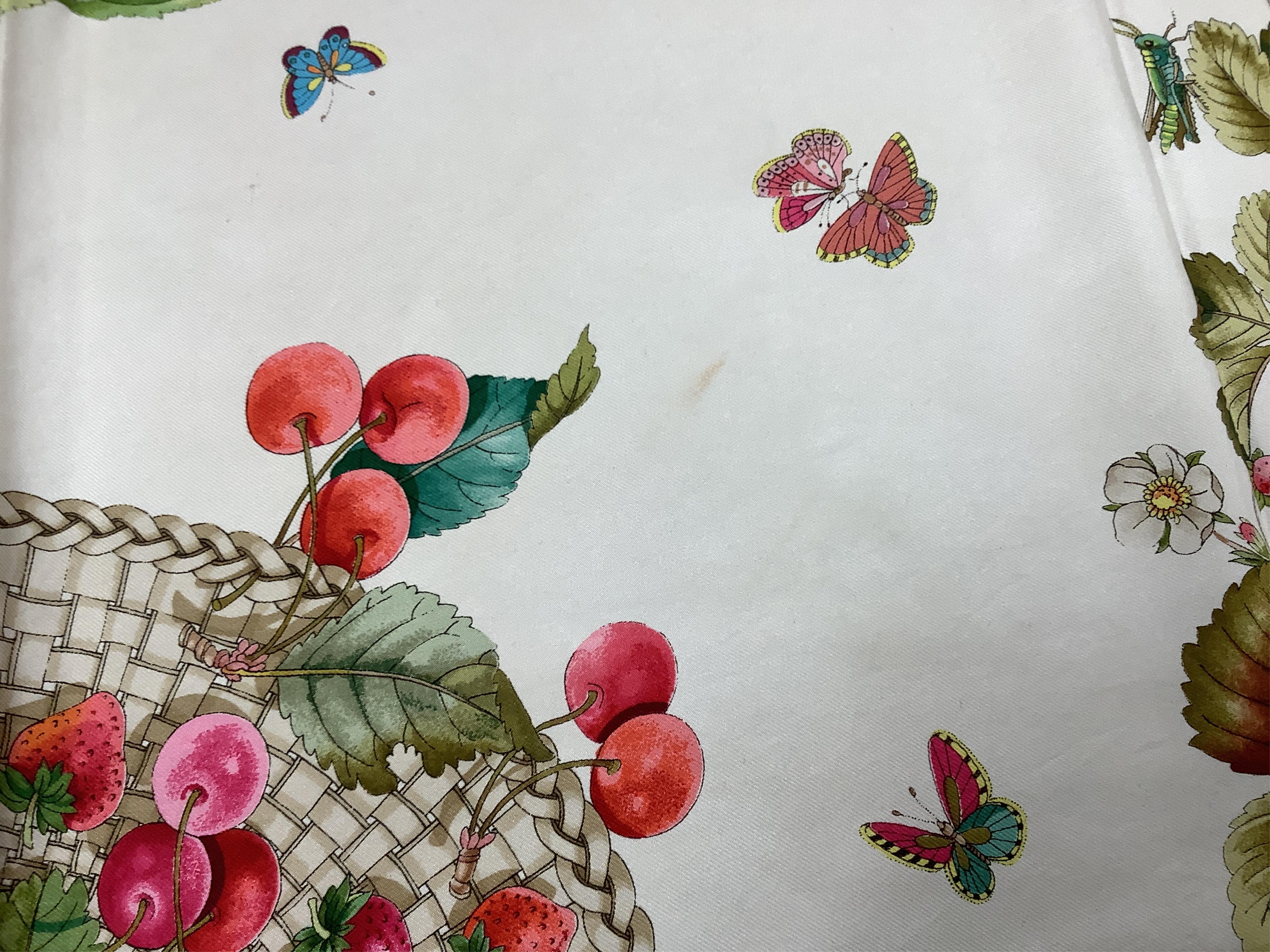 A vintage Gucci silk scarf with a design of strawberries and cherries, 86 x 87cm